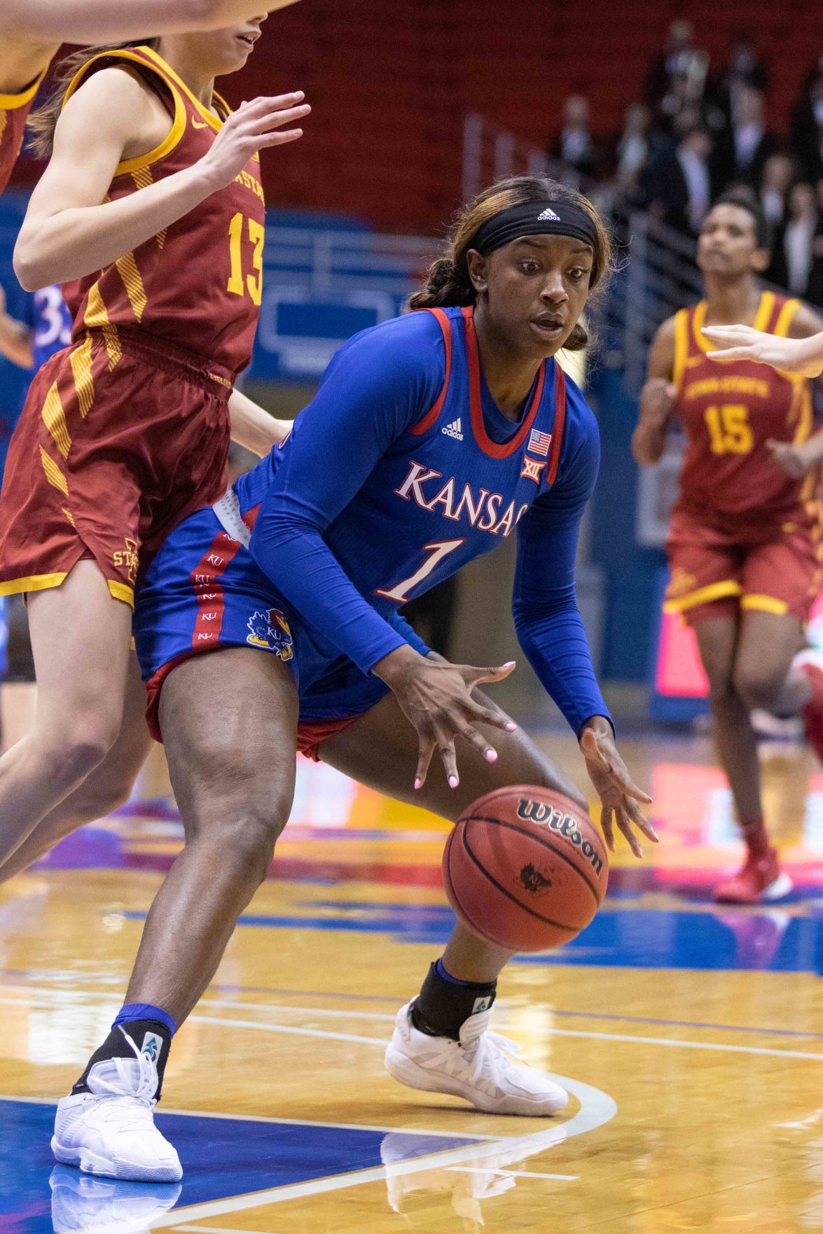 Tina Stephens dribbles the ball in Allen Fieldhouse